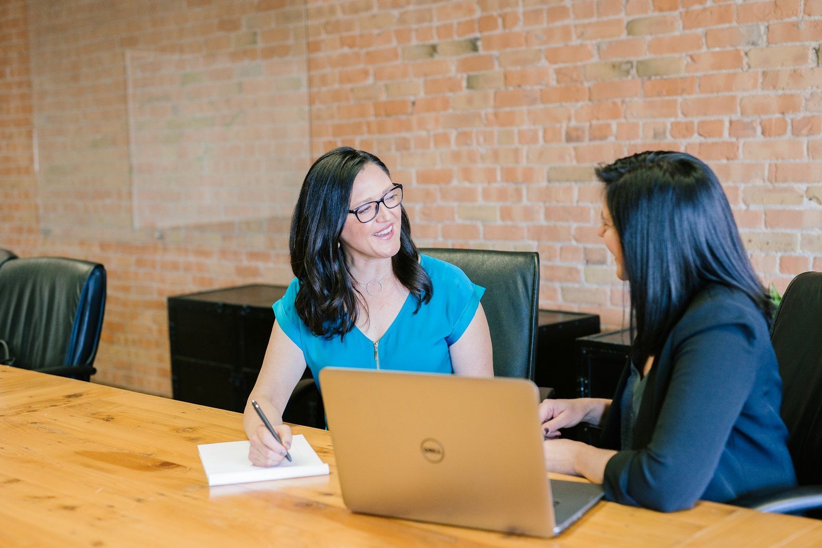 A financial professional listening carefully to a mature couple